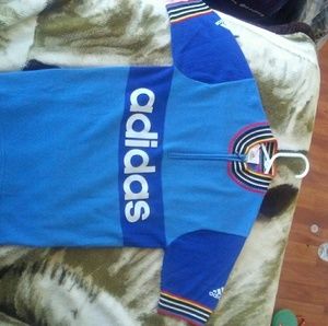 Adidas blue and white biking jersey